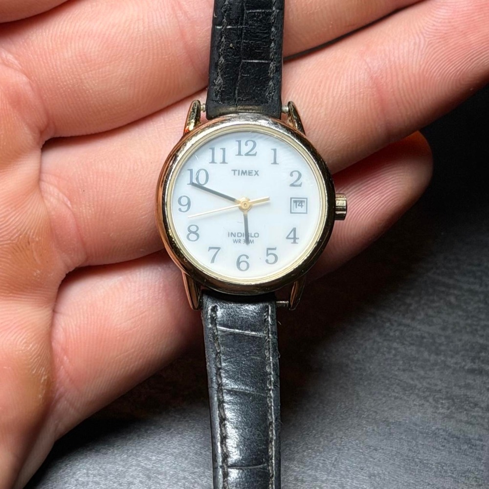 Timex women's watch with black leather strap and gold accents #timex #leather
